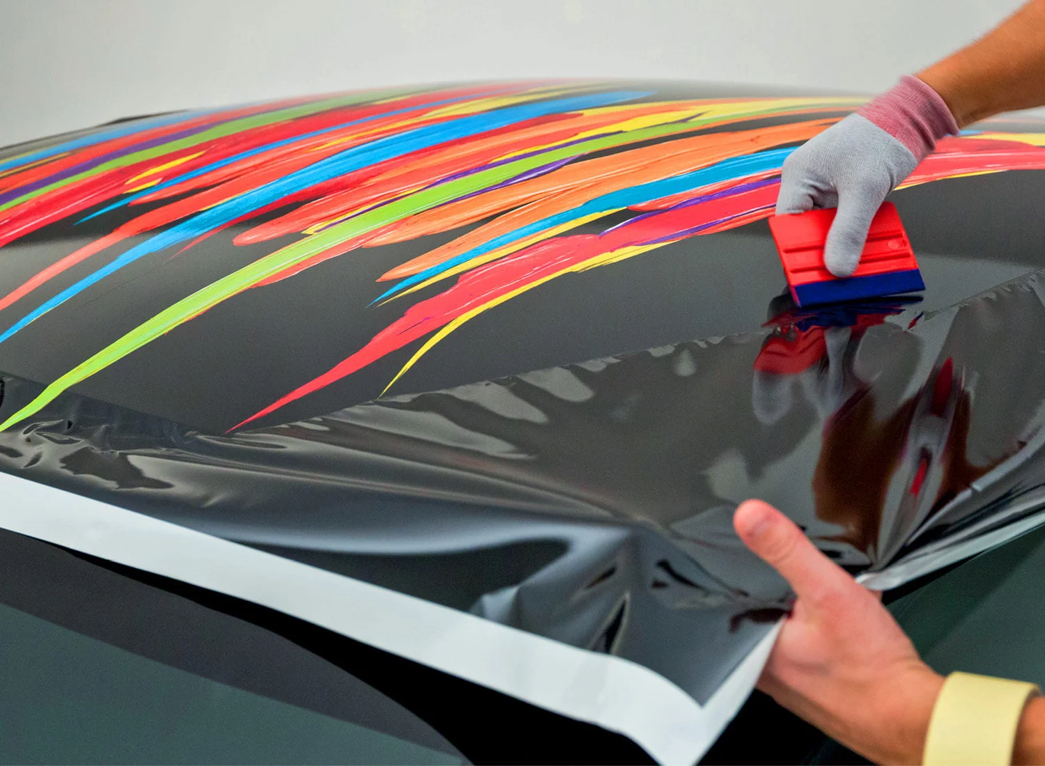 A stunning sports car with a custom vinyl wrap by 911 Motorworks